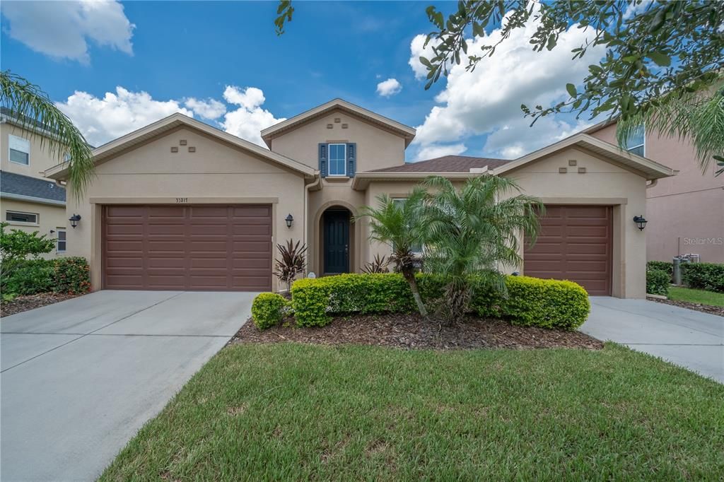 Front picture of this lovely one story 4 bedroom 3 bath single family home with 3 car garage