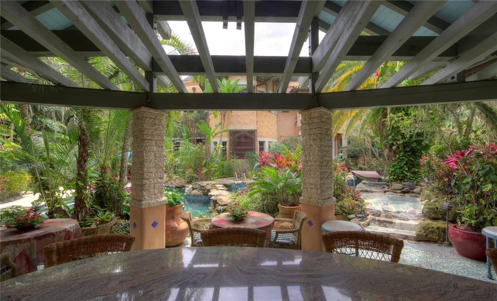 Outdoor sitting area overlooking the tri-level pool.