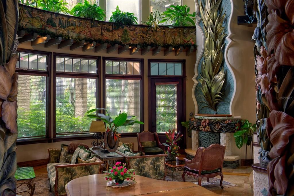 Main Living room featuring more ornate hand crafted artwork.