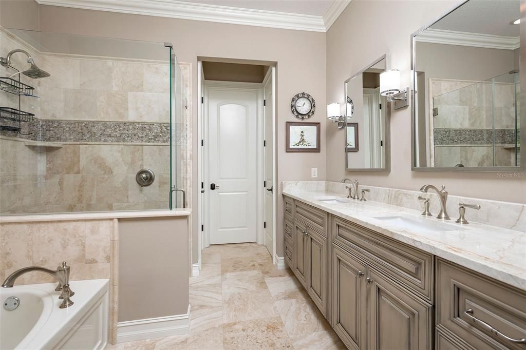 In-law suite bath with double vanities and walk-in shower