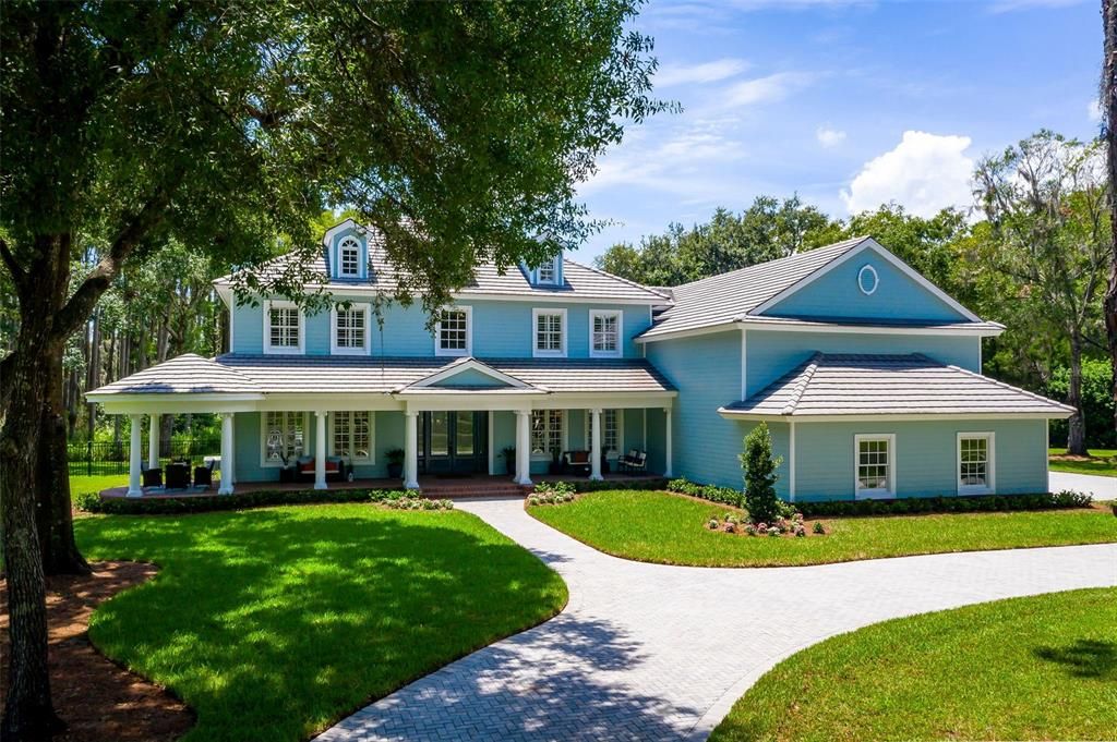 Classic Southern Living Architecture on almost 5 acres in desirable Council Crest.
