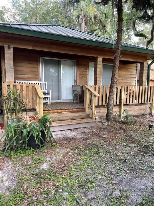 1945 Cabin front of house