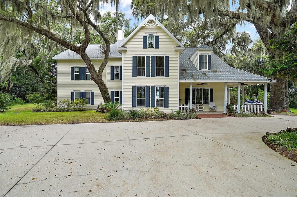 Front Exterior with Majestic Oaks