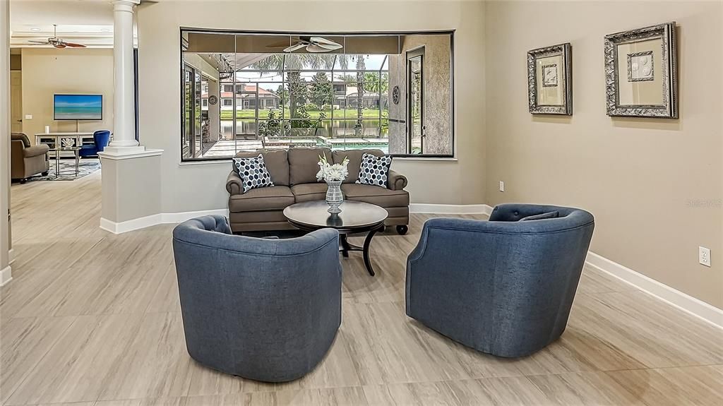 Formal living room with 12 foot ceilings