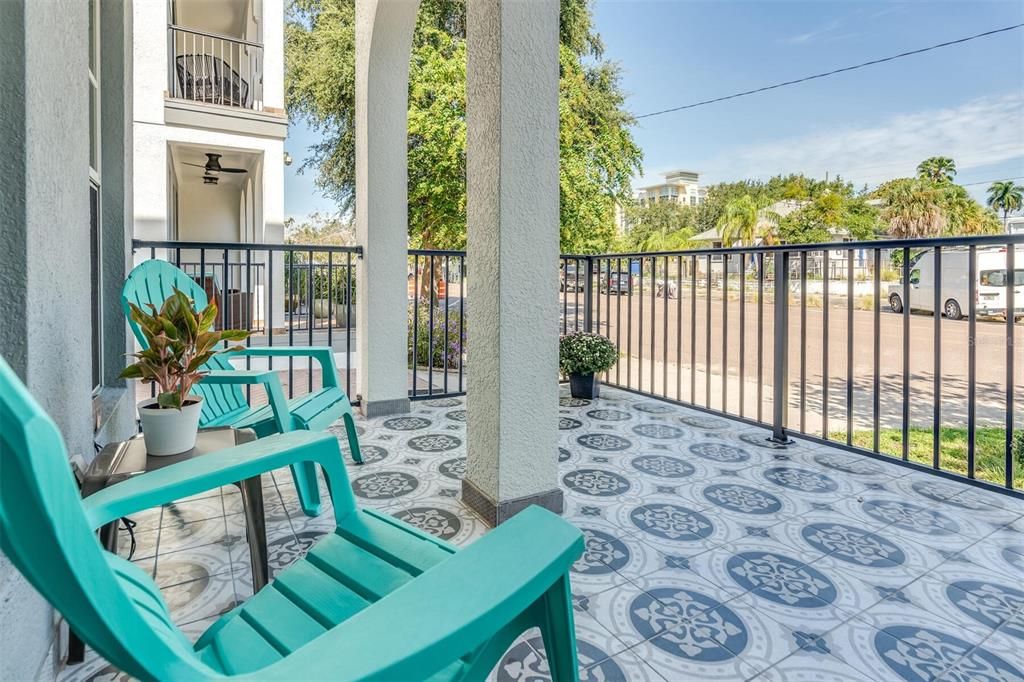 Newly updated: tile, paint trim for the spacious front porch. Sit outside and watch neighbors and the City walk by!