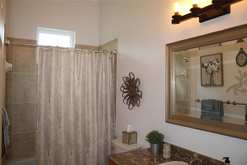 Guest Bathroom with tub/shower combination