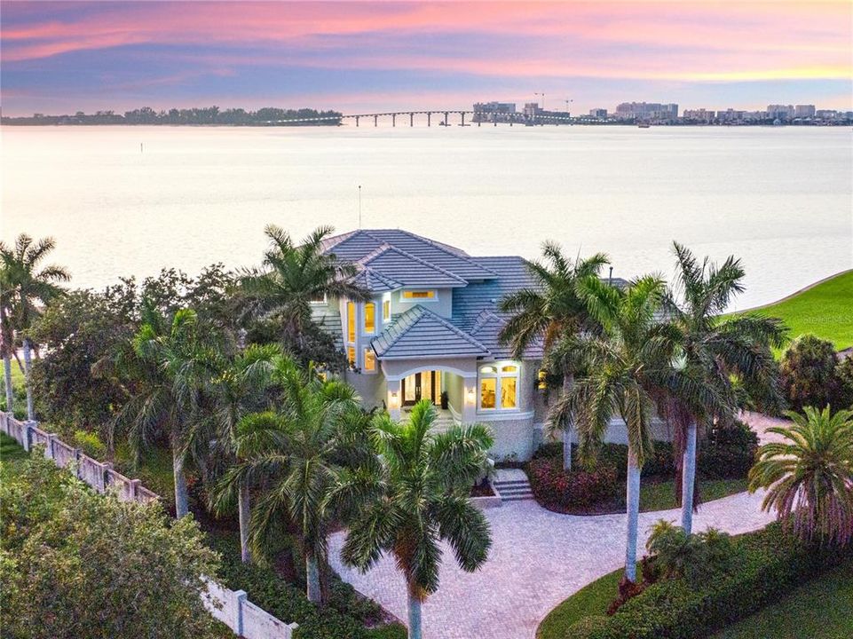 18 Ambleside Exterior  with long, winding driveway, privacy and gorgeous water views!