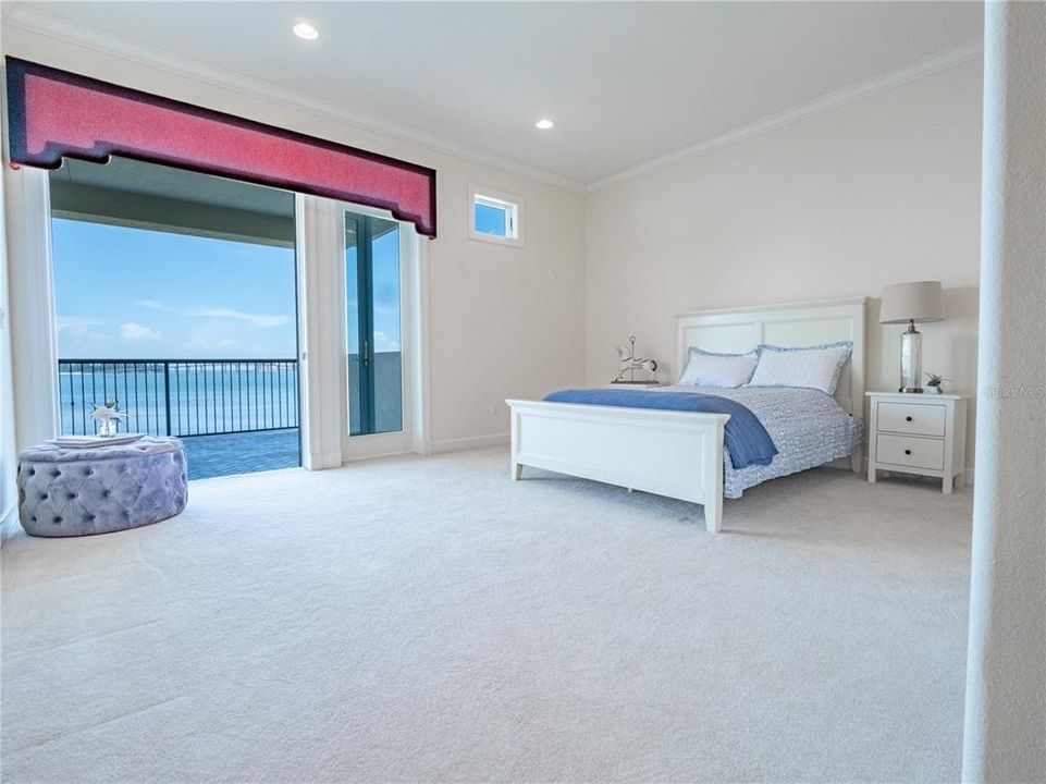 Bedroom number three with its own waterfront balcony