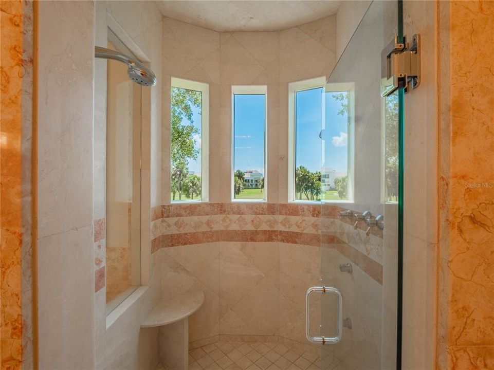 Roomy walk-in shower in the primary suite
