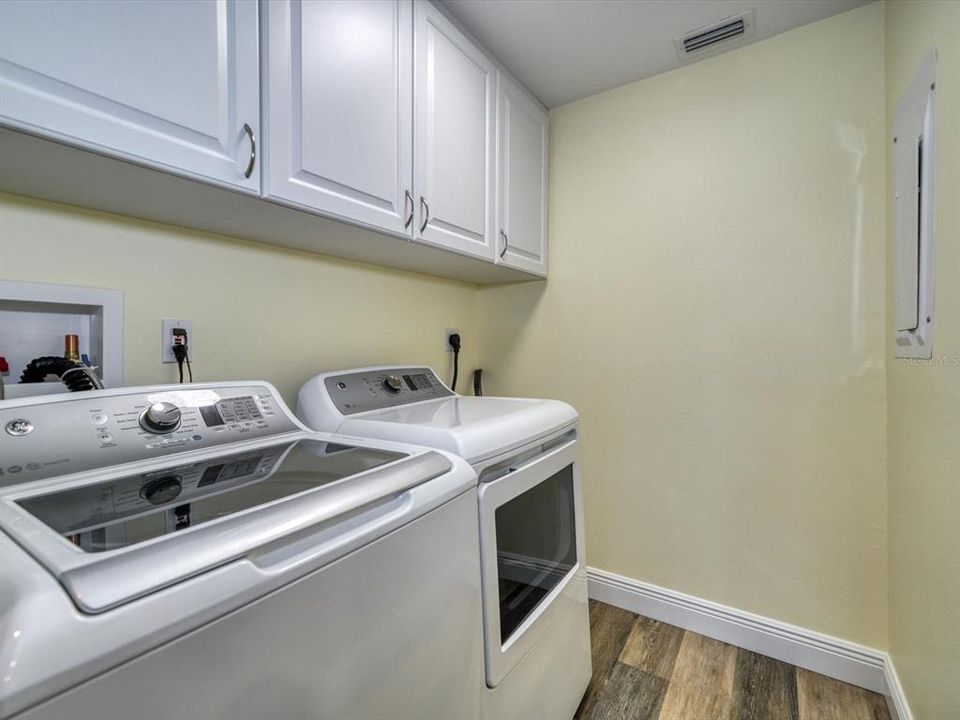Spacious in unit laundry room.
