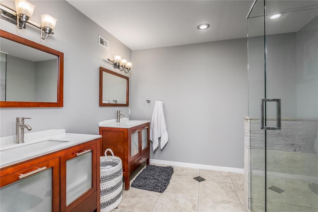 En Suite Master Bathroom with dual vanities and walk in shower