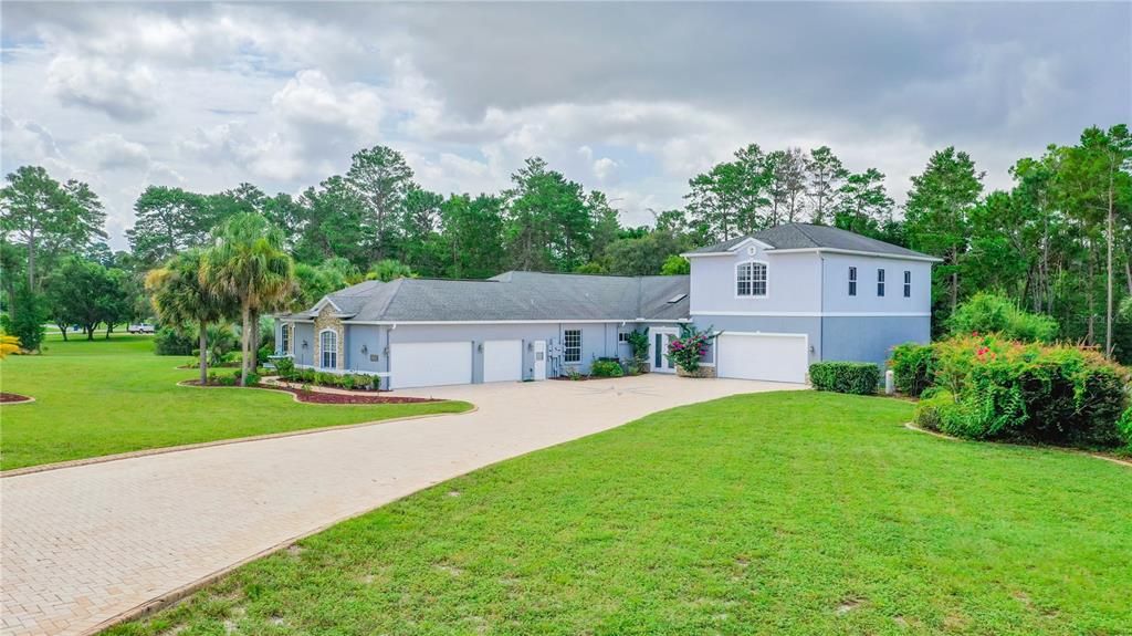 Long driveway leading to this lovely home.