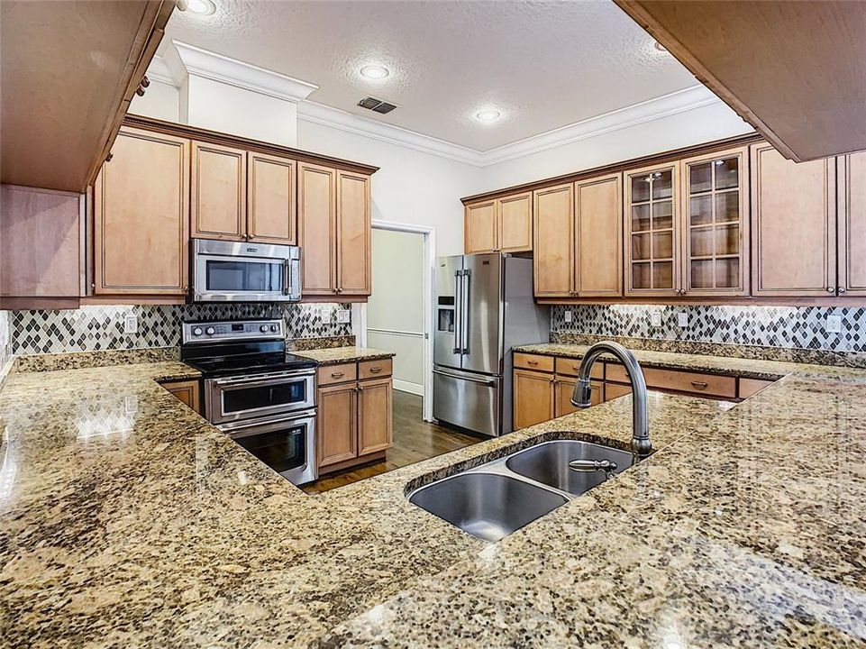 You have just to love the granite countertops and backsplash!