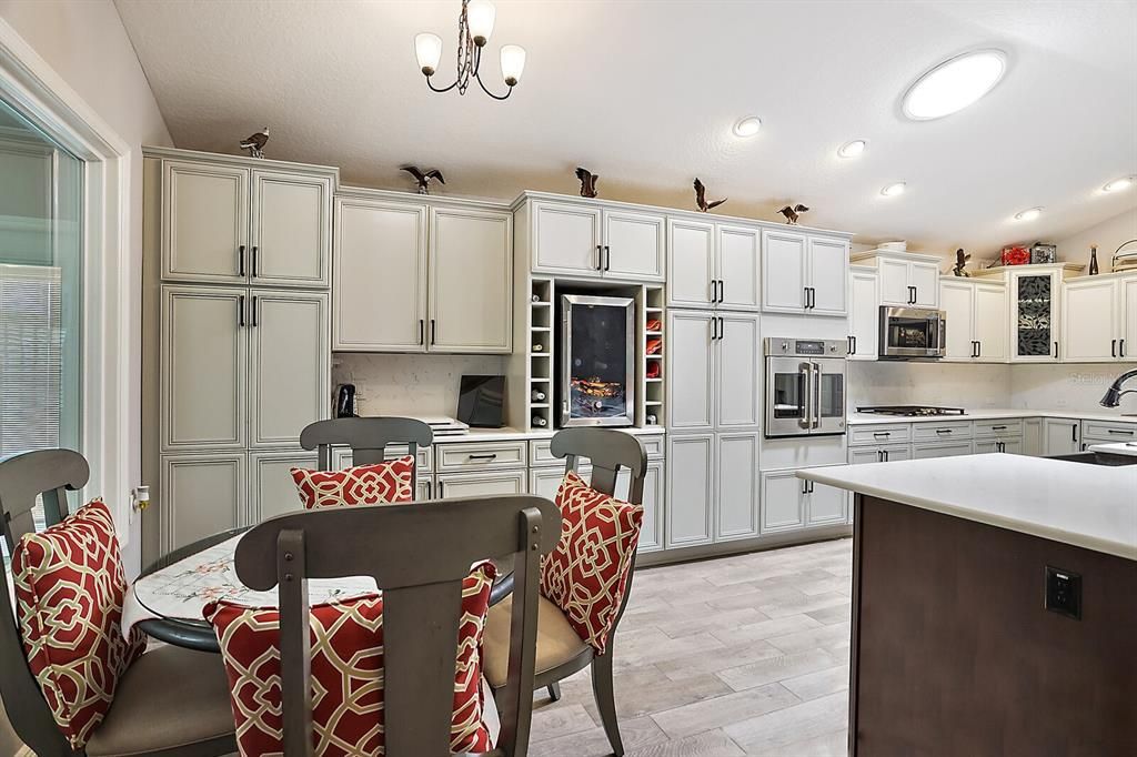 Eat in area of kitchen with picture window to Florida room