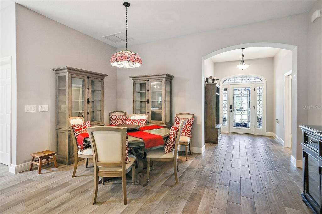 Dining area with upgraded light fixture