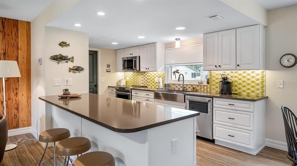 Kithcen with Quartz Countertops and Custom Backsplash