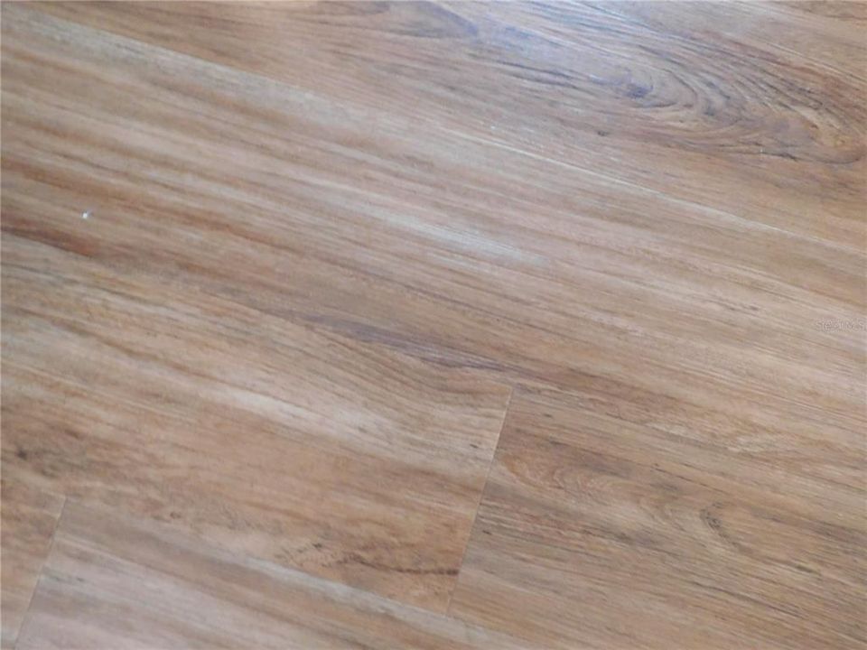 Updated laminate flooring throughout home.