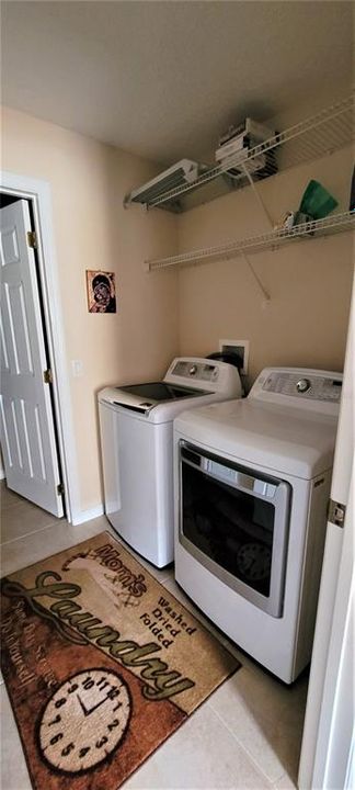 Upstairs Laundry Room with large closet