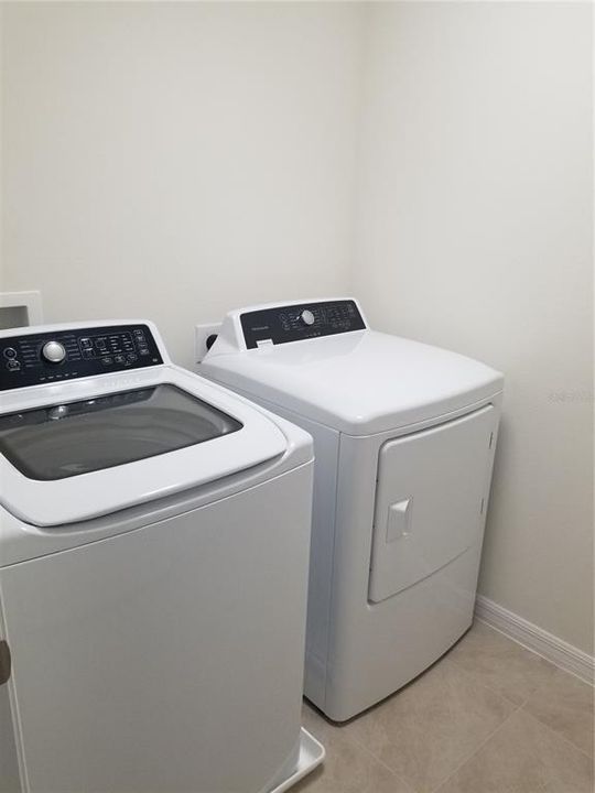 Full size washer and dryer located upstairs