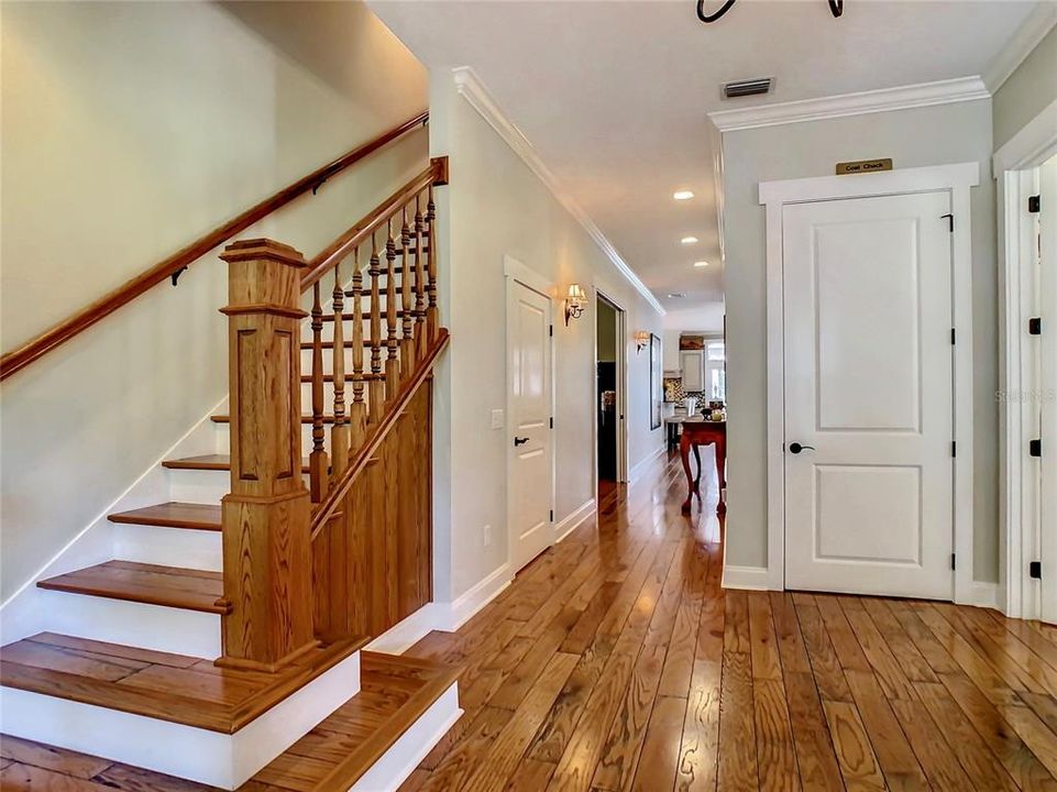 Solid Wood Staircase with Solid Wood Newel Post Create a Beautiful Foyer