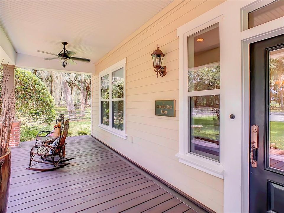 Feels like you're on the cover of Southern Living Magazine on this charming front porch!