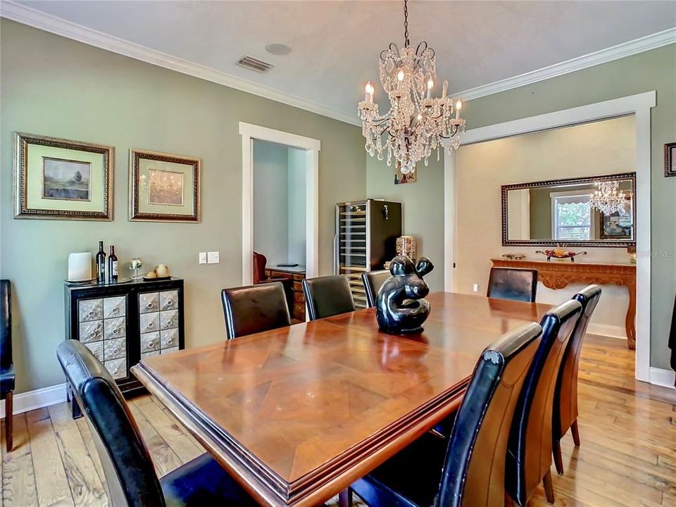 The dining room is so elegant (don't miss the butler's swinging door into the huge pantry)