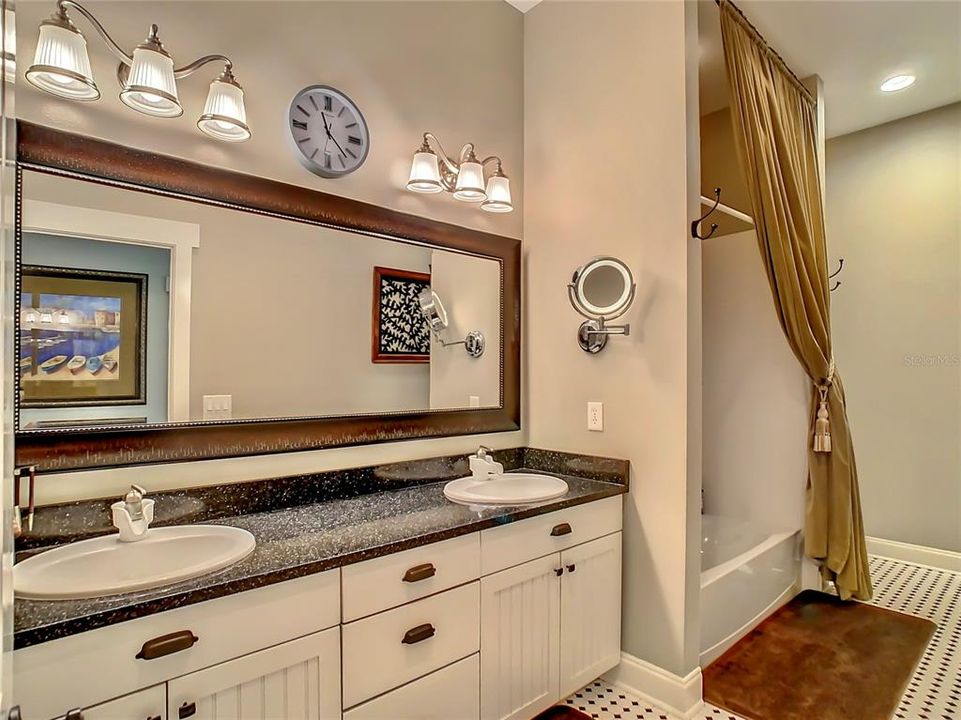 Bath #3 has tub/shower combo, granite counter top w/ dual sinks