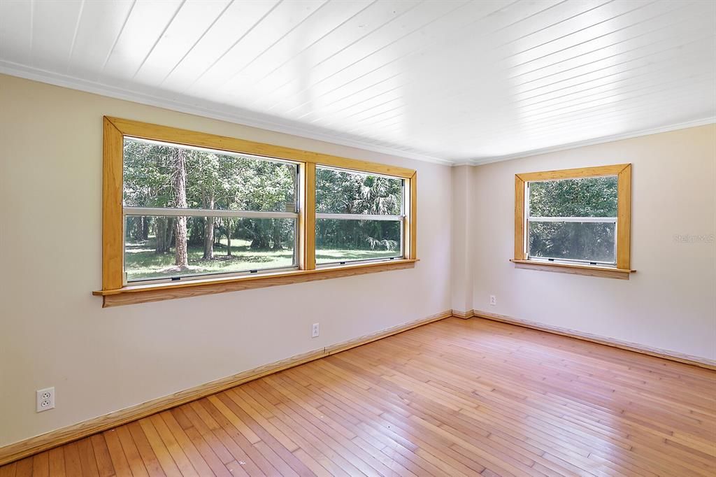 back room overlooking back yard-great for office, hobbies, expansion, extra storage.