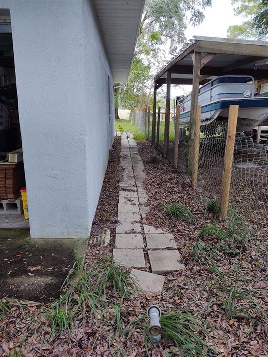 Abandon Well Pipe that could be used for sprinkler system.  North side of home.