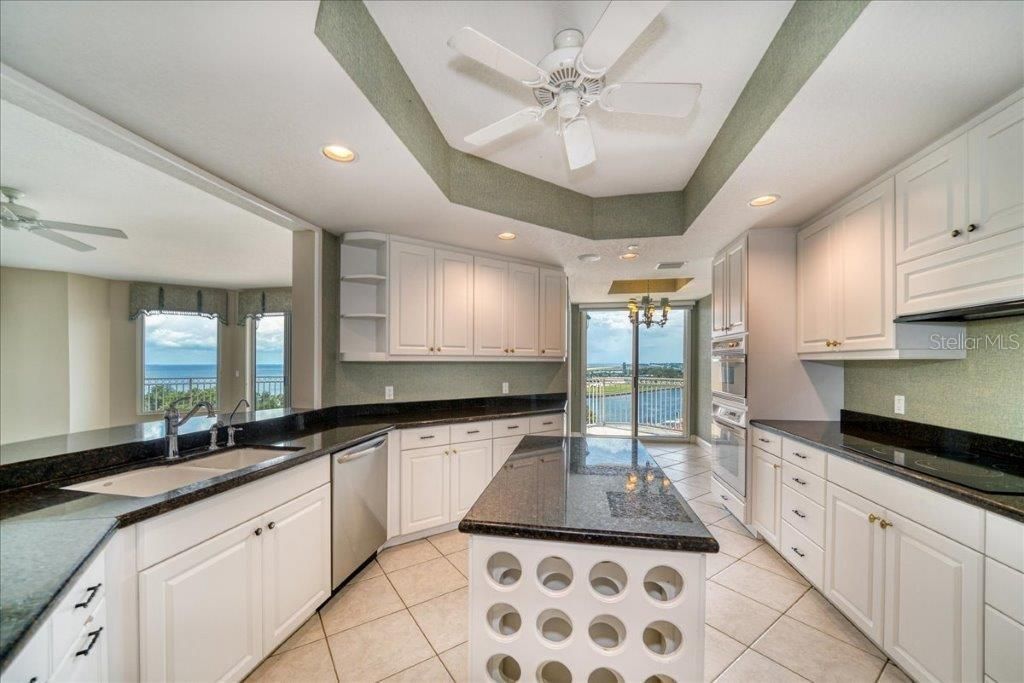 Large kitchen with separate balcony and breakfast nook.