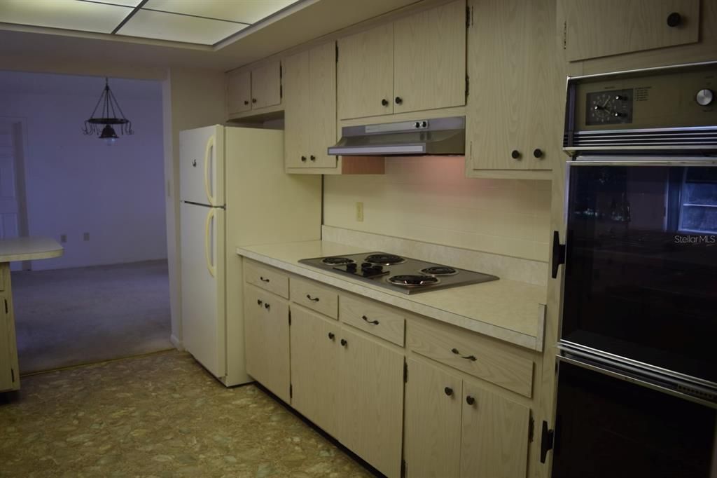 Galley Kitchen with built in double ovens