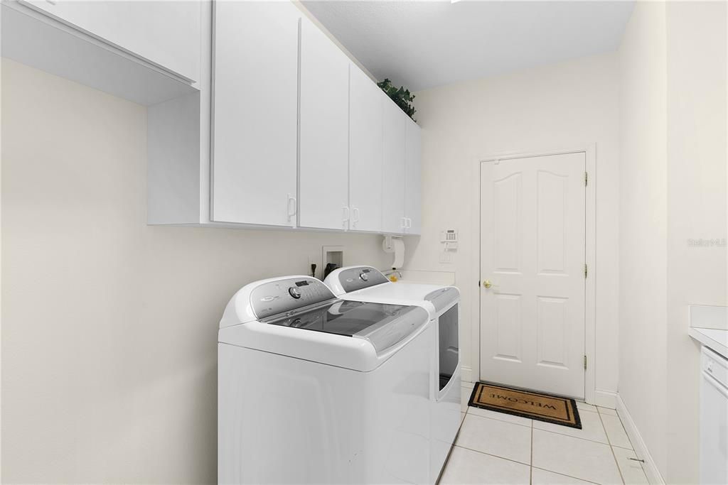 Large/spacious laundry with Trash compactor