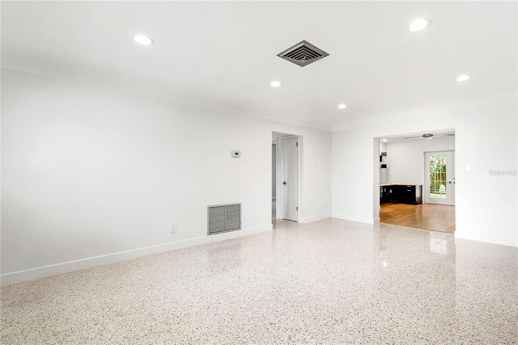 The beautiful terrazzo floors  were professionally polished throughout the home.