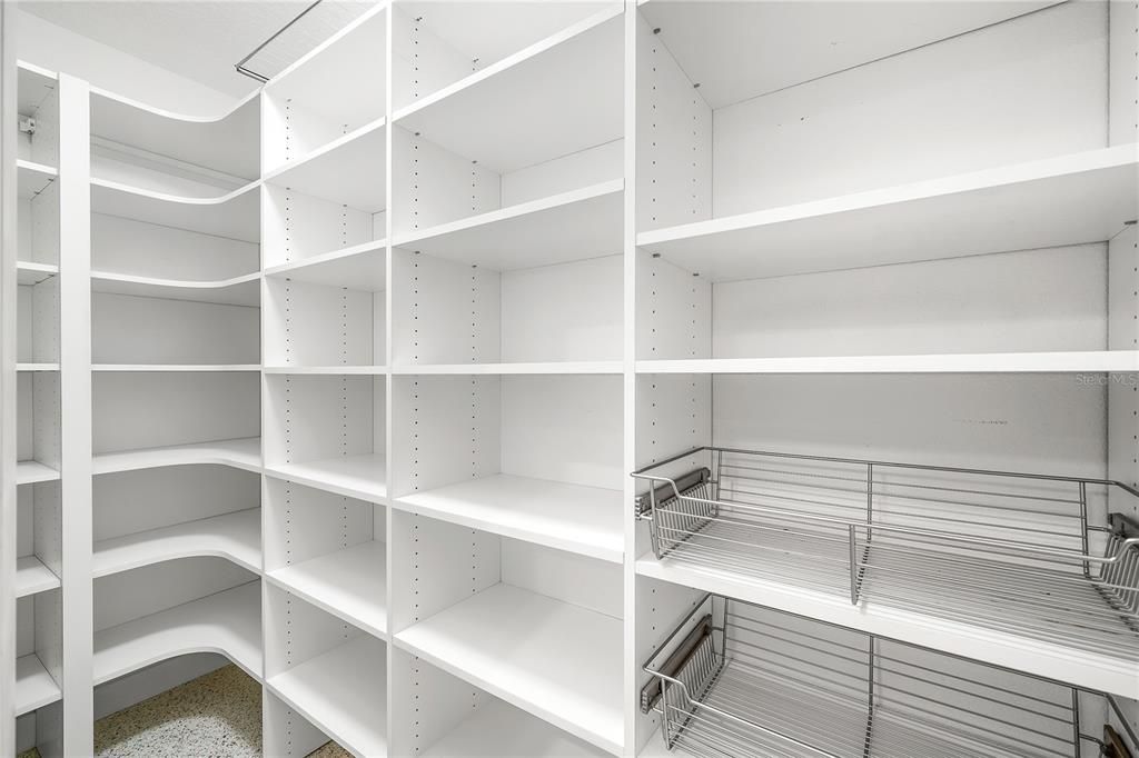 There is a large walk-in pantry off the kitchen.