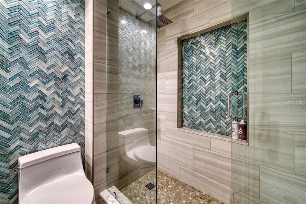 The hall/guest bath is something you will be proud to show your guests!