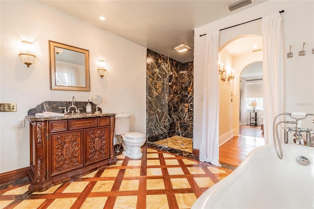 Sizable en-suite bath with beautiful stonework