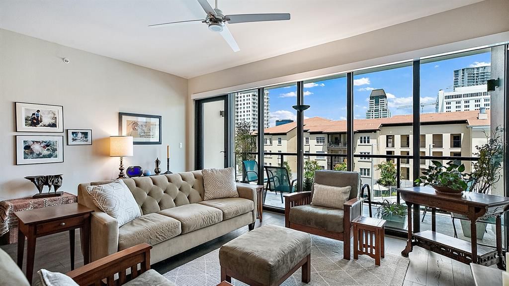 The Living Room has floor to ceiling glass with great views of the Amenity Deck & Downtown St Pete.