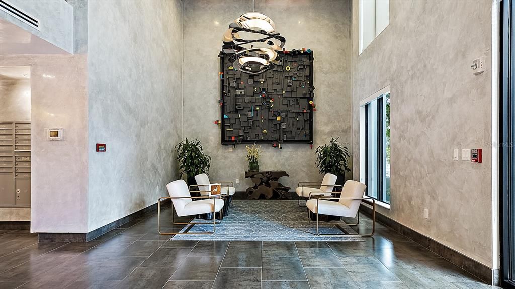 The Lobby (shown here) and other indoor common area's feature artwork and venetian plaster walls.