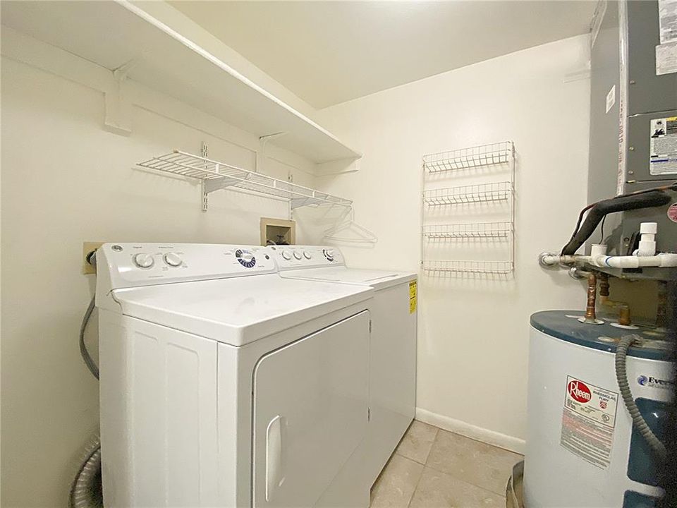 Indoor laundry room with washer/dryer provided