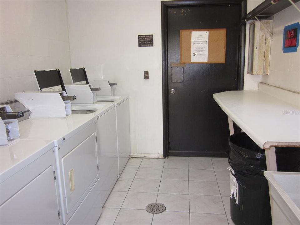 COMMUNITY LAUNDRY ROOM AT S. END OF BLDG.