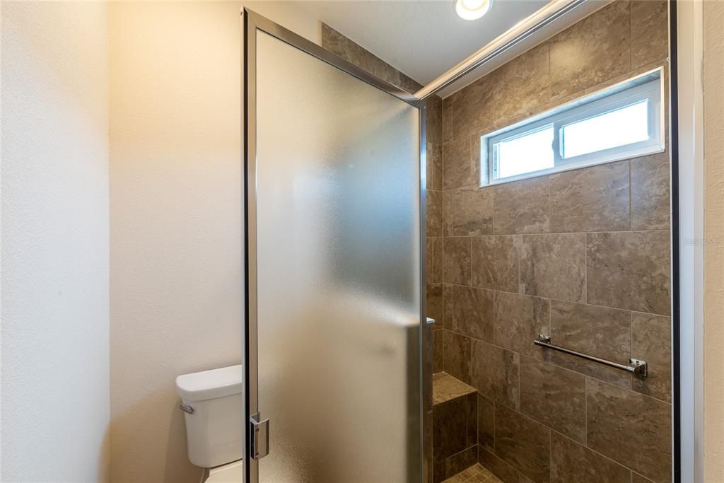 Walk-in tiled shower