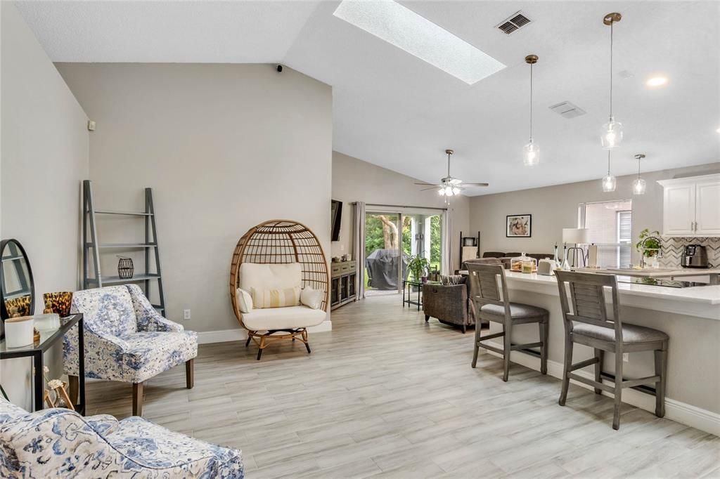 The OPEN FLOOR PLAN, VAULTED CEILINGS, NEUTRAL TONES and SKYLIGHTS make the main living areas welcoming and bright!
