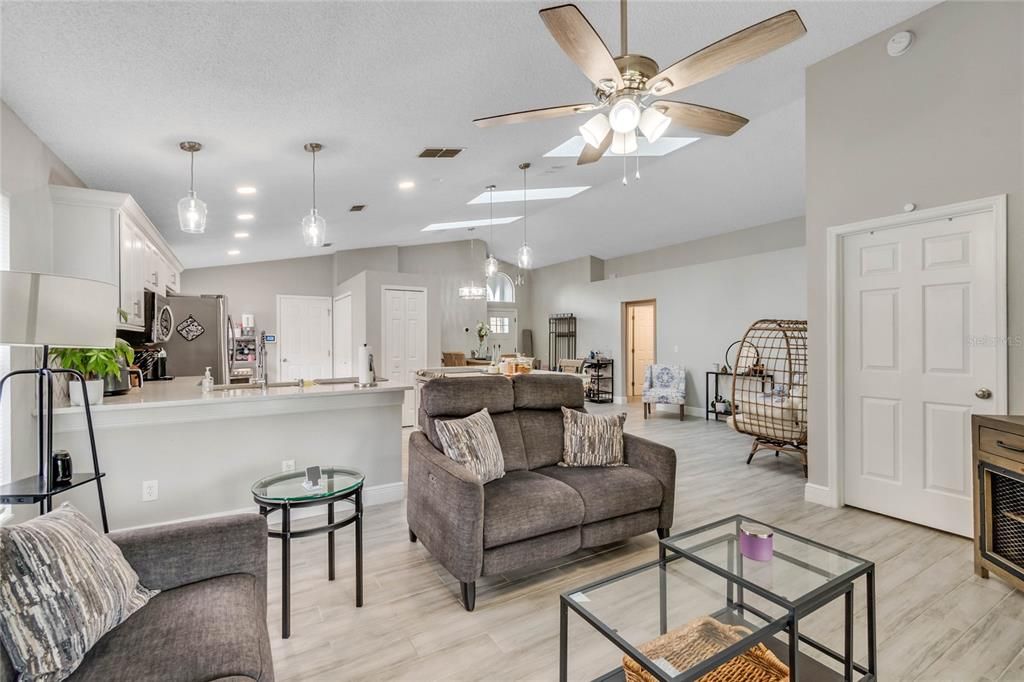 The OPEN FLOOR PLAN, VAULTED CEILINGS, NEUTRAL TONES and SKYLIGHTS make the main living areas welcoming and bright!