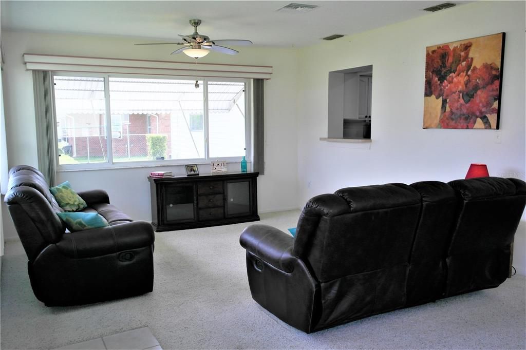 Family room addition with kitchen pass through_121 Heather Lane, Lake Placid