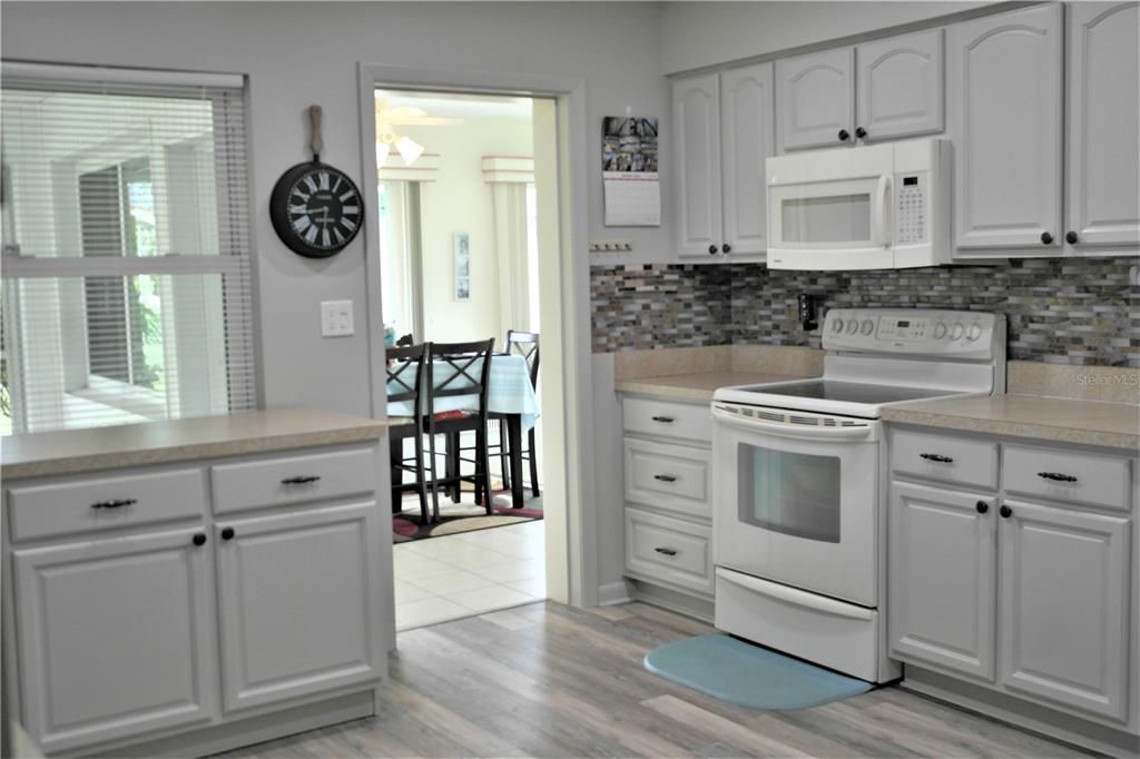 Extra kitchen island for more storage & prep space_121 Heather Lane, Lake Placid