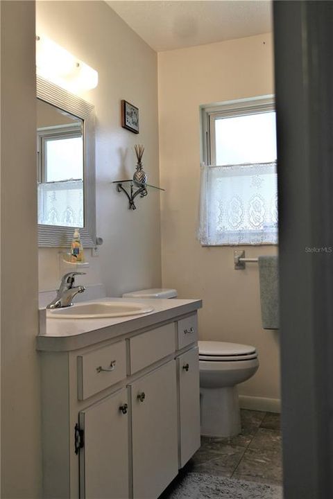 Large vanity for storage in guest bath_121 Heather Lane, Lake Placid