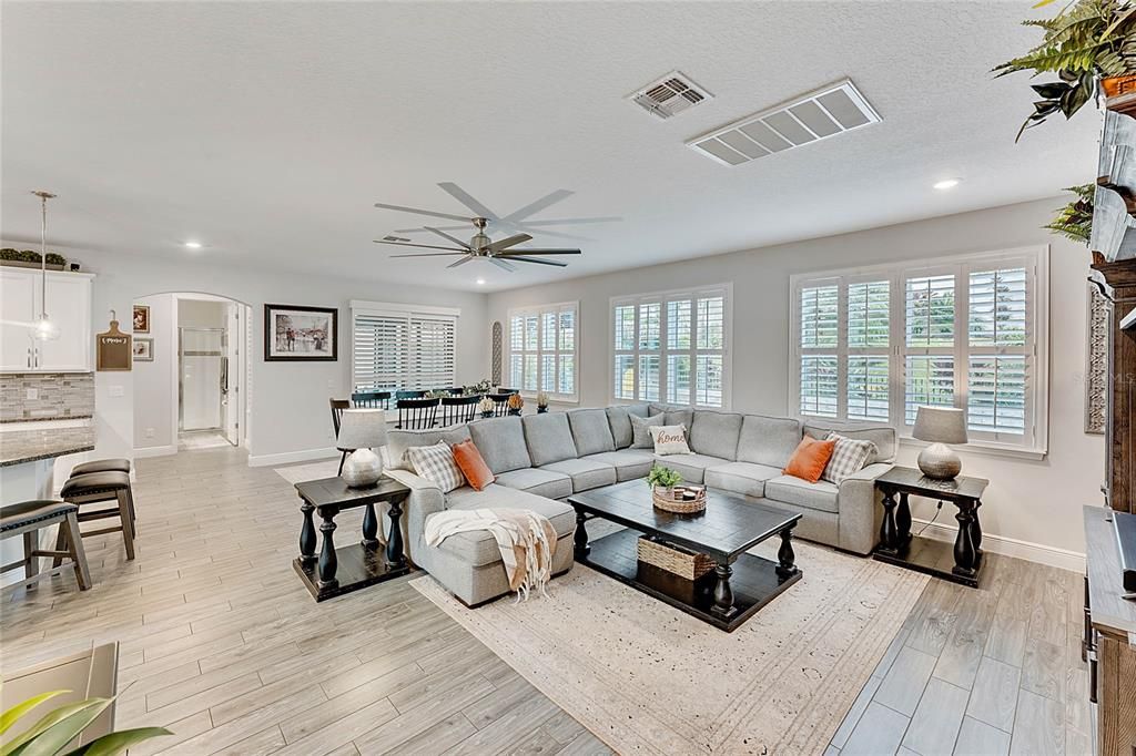 Plantation Shutters, Natural Light, View to the Backyard Oasis