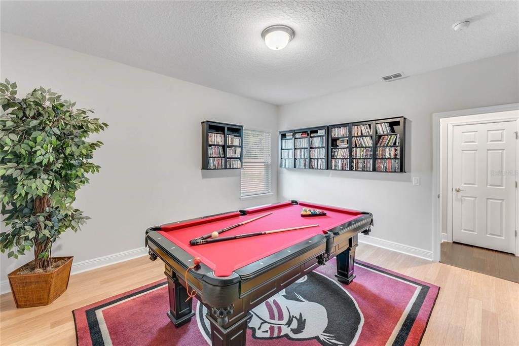 Oversized Bedroom with Walk-In Closet, currently used as a Pool Room