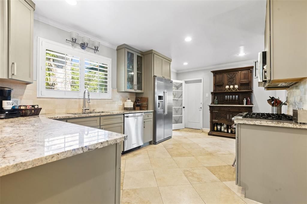Stone counters, Travertine floors, and ample space to move!