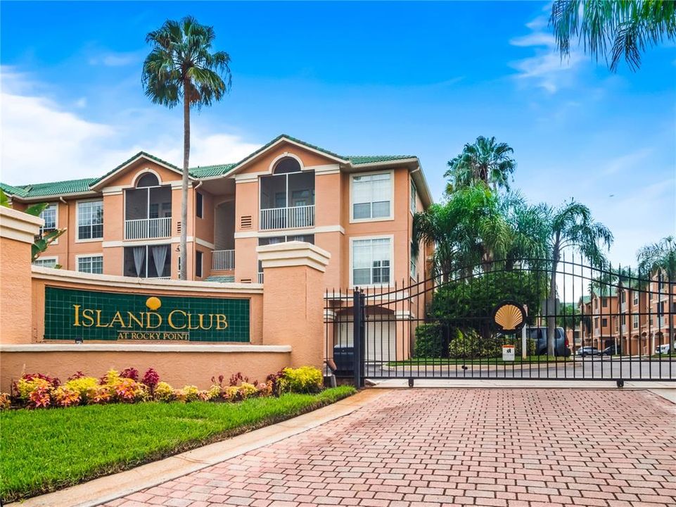 Resort style living in the beautiful gated waterfront community of Island Club at Rocky Point.